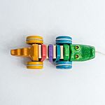 Rainbow Alligator pull-along - Plan Toys