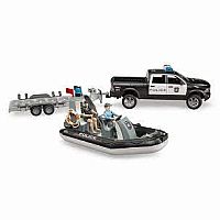Bruder Police Pickup with a Trailer and Boat.