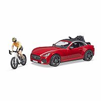 Roadster with 1 Road Bike and Female Cyclist.